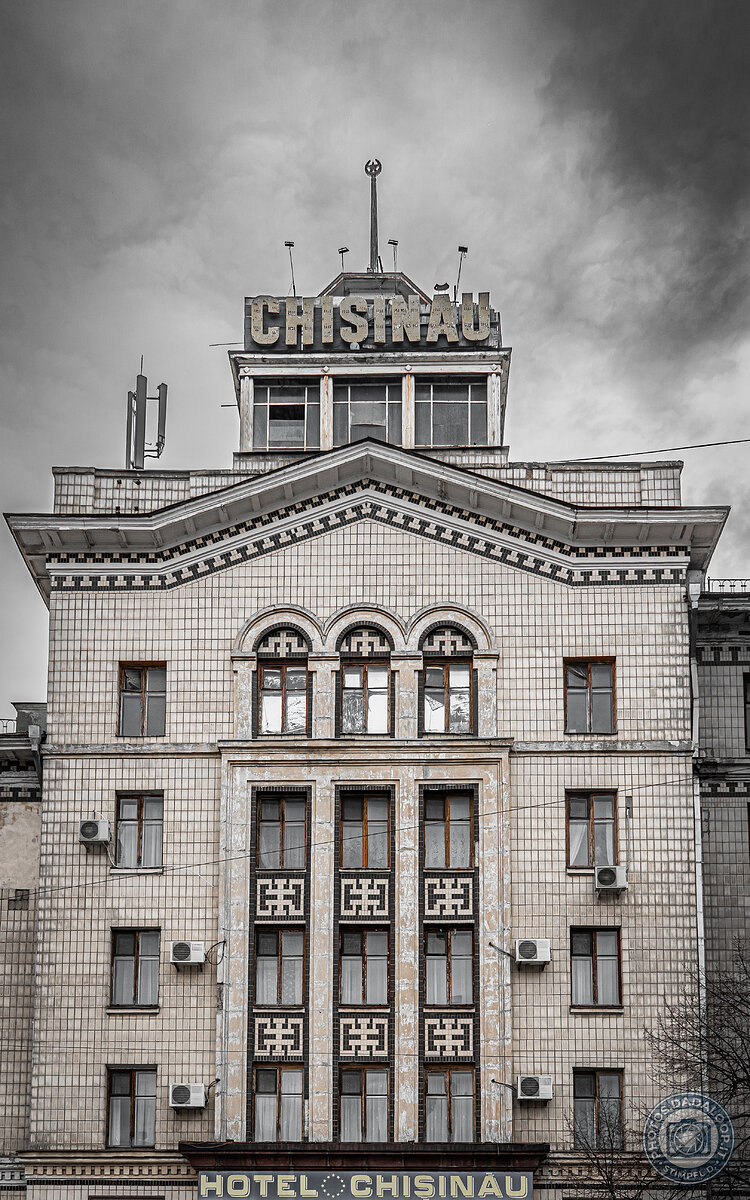 Hotel Chișinău: Soviet-era facade under a leaden sky