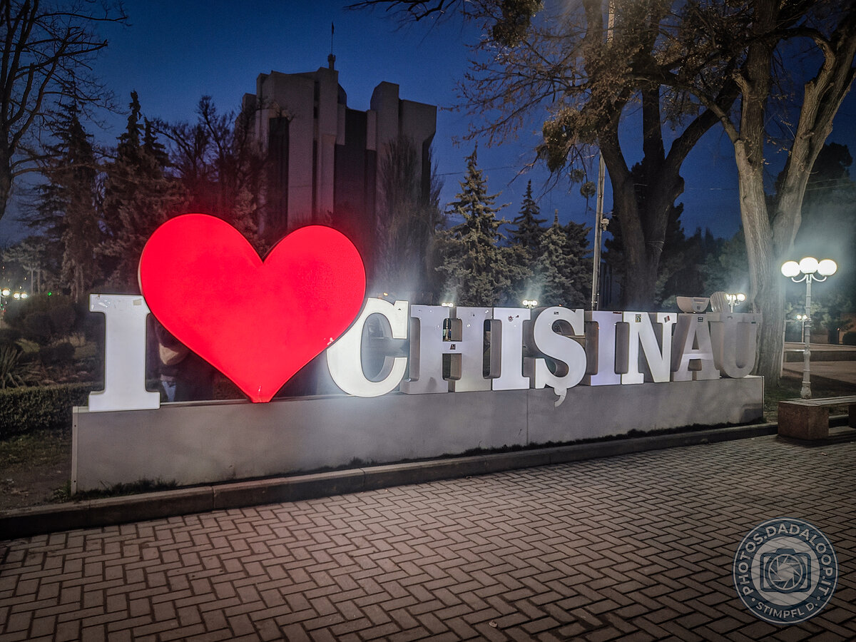 Illuminated "I love Chisinau" sign at dusk
