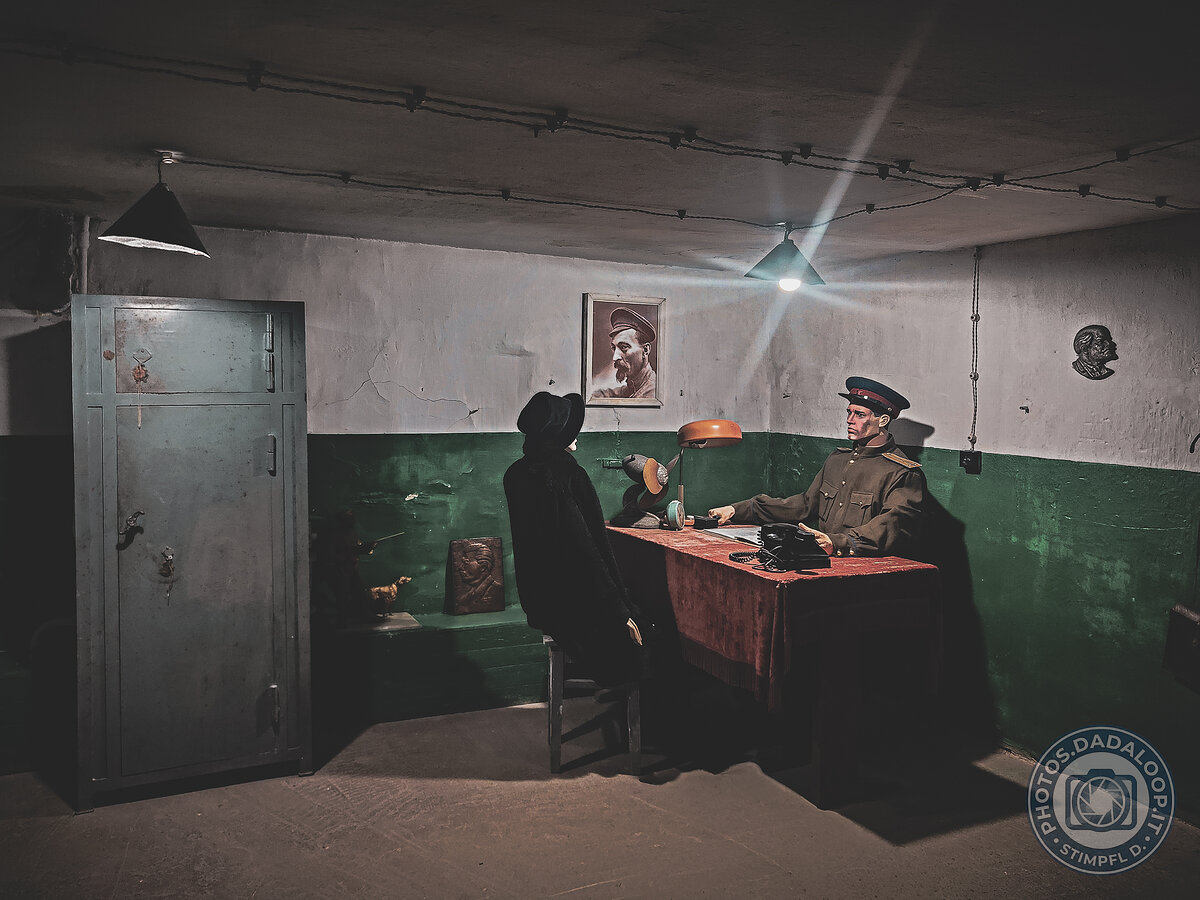 Soviet scene: interrogation in a bare room