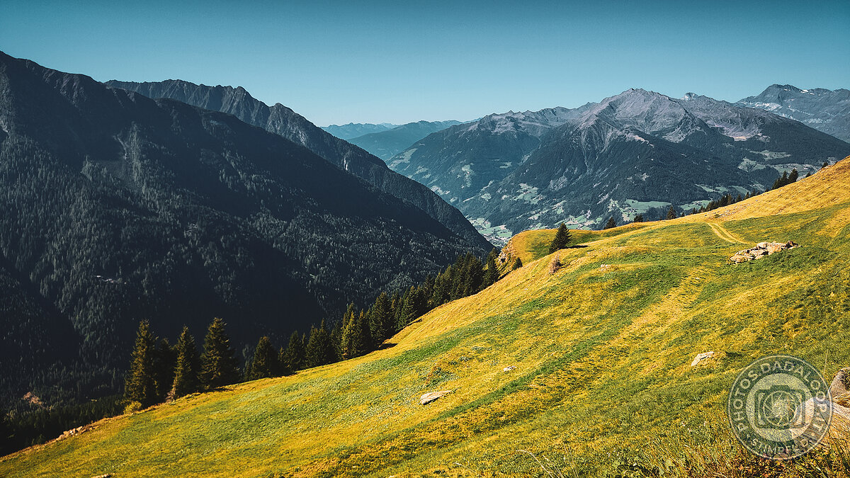 Alpine valley illuminated by the sun