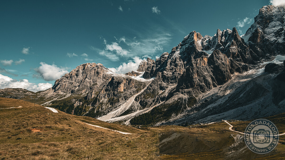 Dolomites: mountain path towards rocky peaks